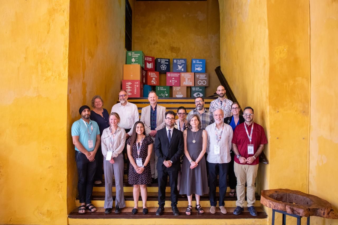 Group of people posing together.